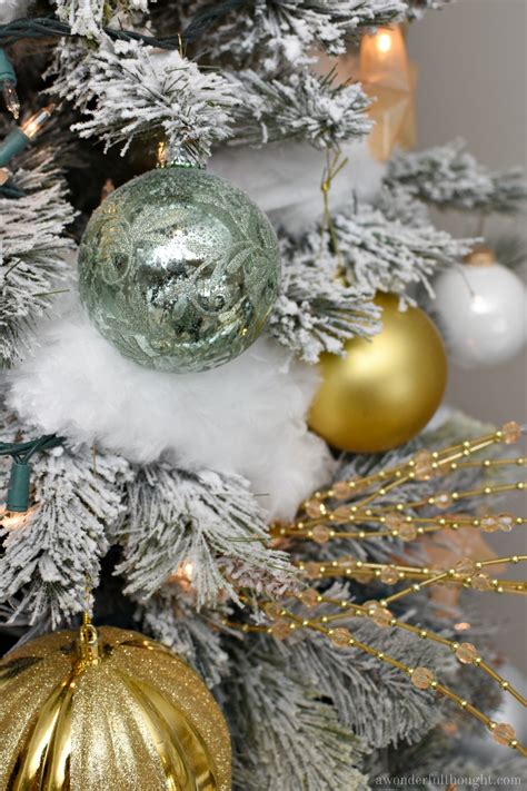 Green and gold christmas decorations. Silver, Gold and Light Green Snowy Christmas Tree - A ...