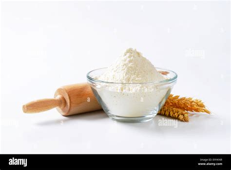 Bowl Of Flour Rolling Pin And Wheat Ears Stock Photo Alamy