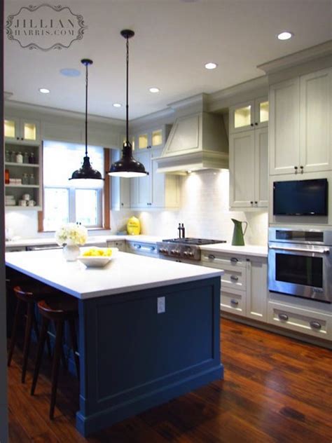 This contemporary shaker kitchen is the perfect addition to any modern kitchen space, featuring stunning grey island and bespoke storage solutions. Jillian Harris: Two-tone kitchen design with light gray ...