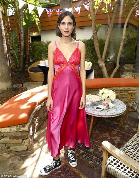 Alexa Chung Shines In Satin Dress As She Hosts Tea Party For Her