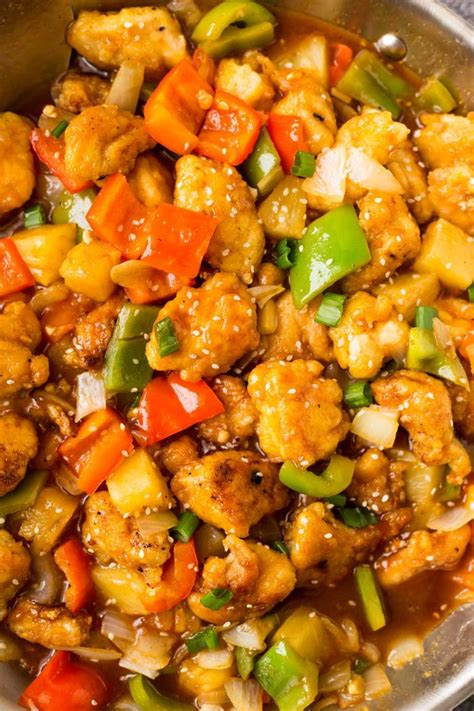 Chicken stir fried with bell peppers, onion, pineapple and mango and glazed with p.f. Healthy Sweet and Sour Chicken (Paleo, Whole30) | The ...
