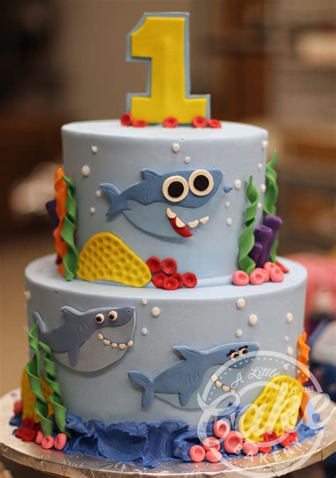Children's birthday party cakes designs are our speciality. Baby Shark First Birthday Cake | Shark birthday cakes ...