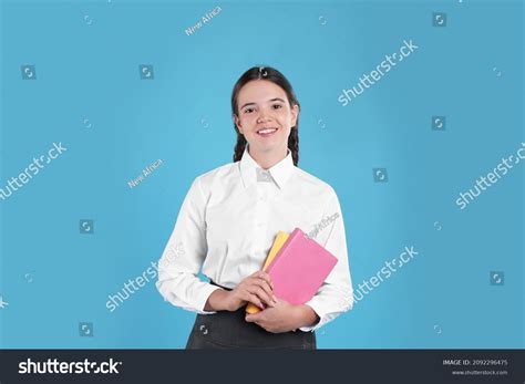 Teenage Girl School Uniform Books On Stock Photo 2092296475 Shutterstock