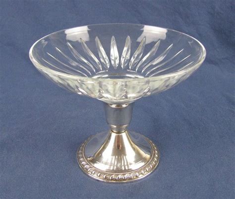 The high handles are embellished with palmettes, acanthus leaves, and the final spiral finishes in the shape of. Vintage Duchin Weighted Sterling Silver Pedestal Compote ...