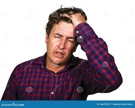 Dramatic Portrait Of Stressed And Overwhelmed 30s Or 40s Man Holding