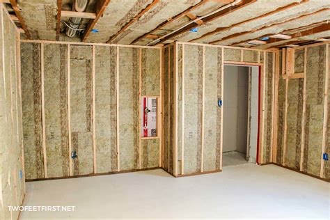 Should i frame close the wall and around it? Insulating and framing a basement