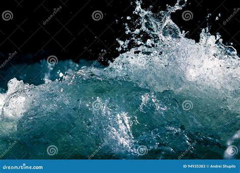 Splash Of Stormy Water In The Ocean On A Black Background Stock Image
