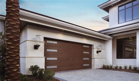 Your front door helps form your home's identity & says a lot about you as well. Clopay® MODERN STEEL™ collection Garage Doors | The Doorman