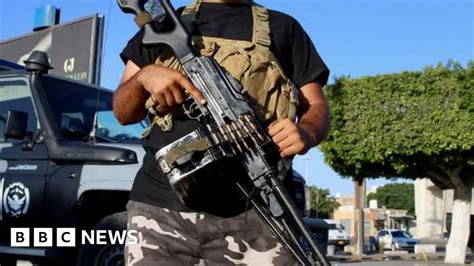 Libya Militias Battle In Tripoli After Commanders Arrest Bbc News
