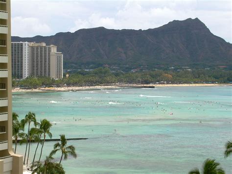 View Of Diamond Head And Waikiki Beach With Surfers In The Ocean Oahu