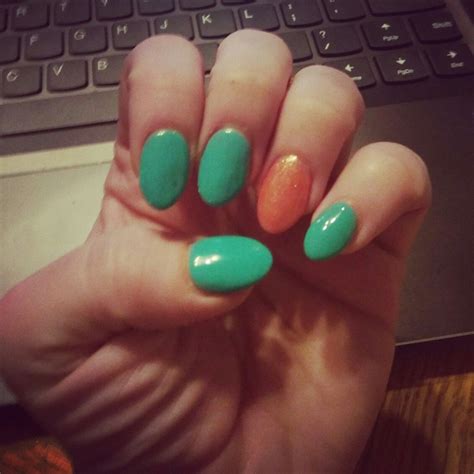 30 nails summer colors 2019. Teal and coral almond shaped nails #almondshapednails ...