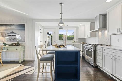 Shop our great assortment of kitchen carts and kitchen islands at every day low prices. Coastal White Kitchen with Navy Island | Blue kitchen ...