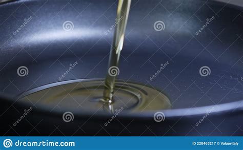 Pan With Oil Cook Pours Sunflower Oil Into A Frying Pan Macro Shot Stock Image Image Of Heat