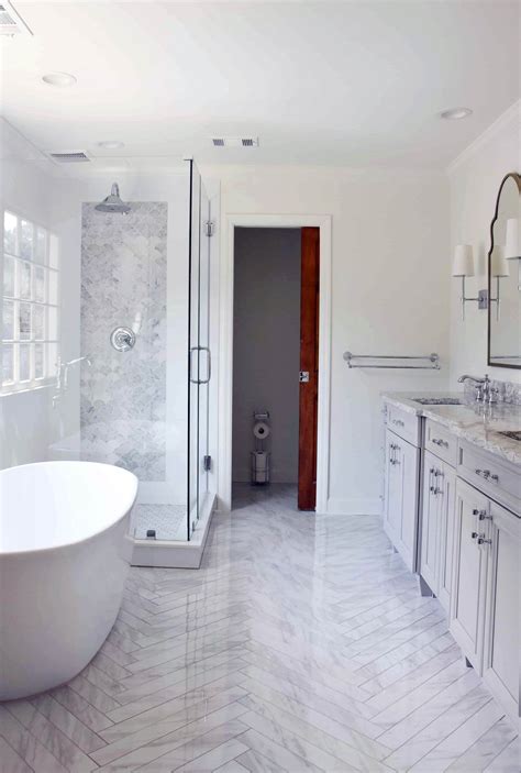 Audrey hall this tiny bathroom by envi interior design studio, via houzz, has more farmhouse than modern, but still meets the definition of a modern farmhouse.the small space is made to look bigger, thanks to a reflective tile in a neutral shade, and a large frameless mirror. 10 Houzz Bathroom Colors, Some of the Most Incredible and also Lovely For Your House | DIYHous