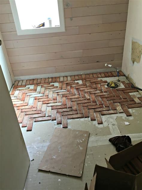 Classic black and white marble is still popular but other. Brick tile floor Brick veneer bathroom and kitchen ...