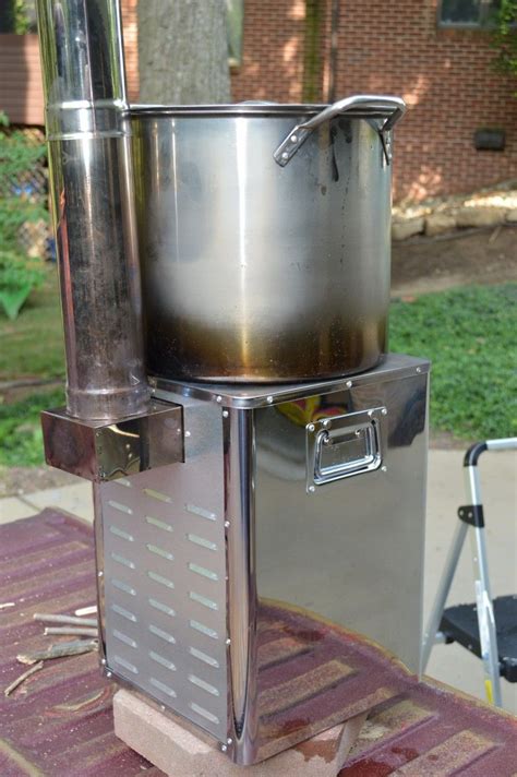 I guess flaming and melted plastic isn't as bad. NEW Rocket Stove Makes Electricity & Charges Cell Phones ...
