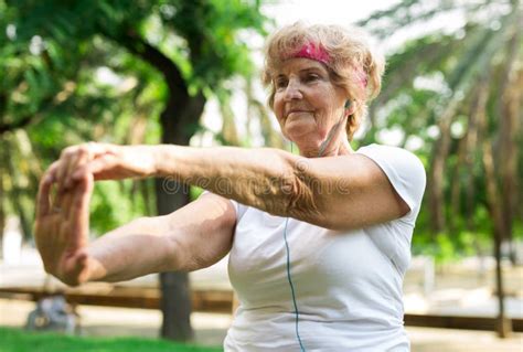 Old Lady Doing Fitness Exercises In Park Stock Image Image Of 7580 Mature 243301219