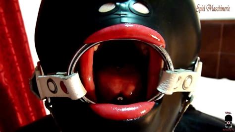 Intro Black Latex Slut With Ring Gag Deepthroated Cock Dildo And Fucked