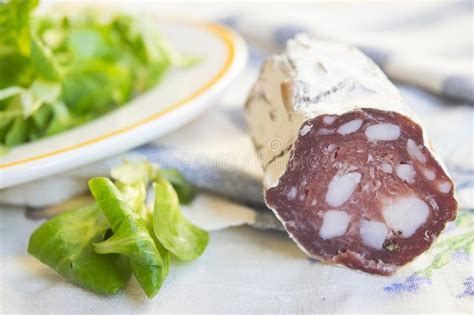 They're simmered in water for around 2 hours. Salami Smoked Sausage Near Lettuce Salade Stock Image ...