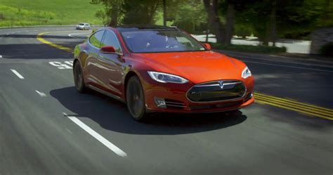 Tesla P85d Dodge Charger Hellcat Duke It Out With Motor Trend Video