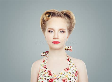 Young Blonde Woman With Vintage Retro Pinup Hairstyle And Makeup Stock