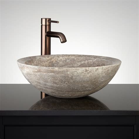 Also the pop of wall color. Round Polished Travertine Vessel Sink - Bathroom