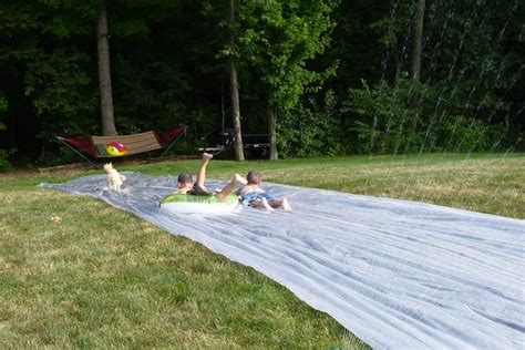 Diy slip n' slide with visqueen plastic. DIY Slip 'N Slide - Genius! - Bob Vila