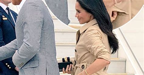 Meghan Markle Spotted With Her Mobile Phone During Royal Tour Of