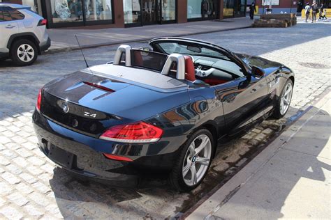 This rwd roadster continues to feature a retractable hardtop and is available in three trim levels: 2014 BMW Z4 sDrive28i Stock # 14Z4BMW1 for sale near New York, NY | NY BMW Dealer