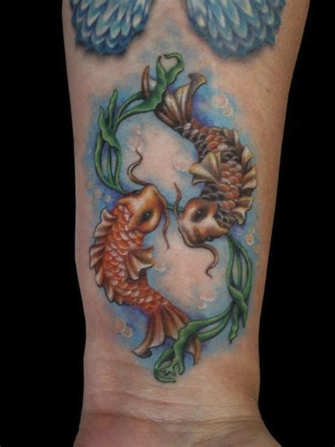 These stunning japanese fish are known for their big eyes, and the colors here are remarkable. 39 Attractive Wrist Tattoos