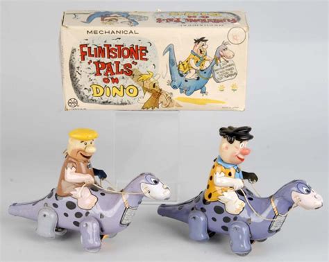 Lot Detail Lot Of 2 Tin Flintstones Riding Wind Up Toys