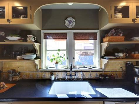 Our cardiff console/china cabinet features 2 wood framed glass doors and 8 drawers for all your storage and display needs. Gray Mediterranean Kitchen With Open Shelving | HGTV