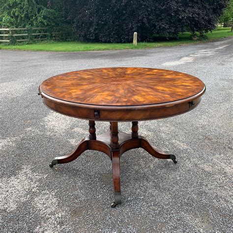 Extending any one of our dining tables is designed to be as easy and straightforward as possible; Extending Circular Dining Table Seats Eight | 705009 ...