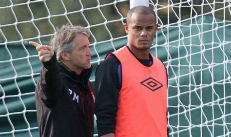 Roberto mancini's suave style has not gone unnoticed during the euroscredit: Roberto Mancini at war with play-away Vincent Kompany ...