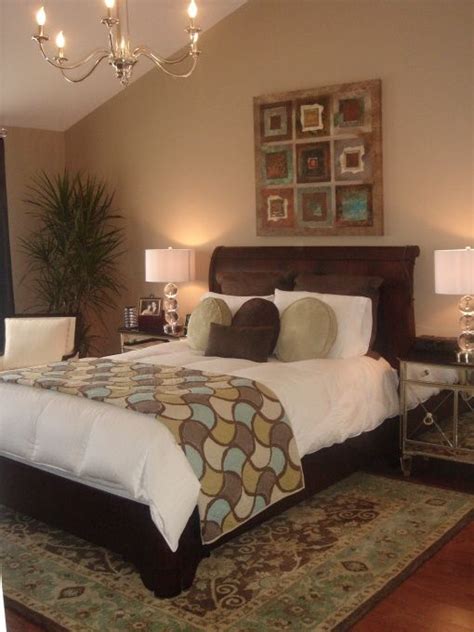The room the bedroom walls are decorated with paintings, photos, and also complement the room with vases and figurines that correspond to the general interior style. "RMS Inspired" Master Bedroom-Outside of my Zone - Bedroom ...