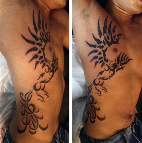 Additional elements can also be incorporated into the phoenix design such as dragons, the sun, flames, tribal tattoo patterns, chinese symbols or japanese kanji. 40 Tribal Phoenix Tattoo Designs For Men - Mythology Ink Ideas
