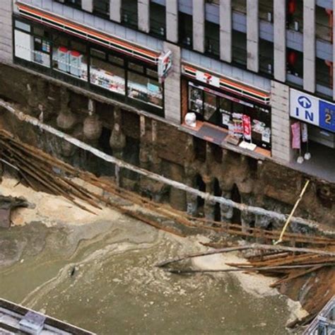 Huge Sinkhole Swallows Up Road In Fukuoka Japan In Pictures And Videos