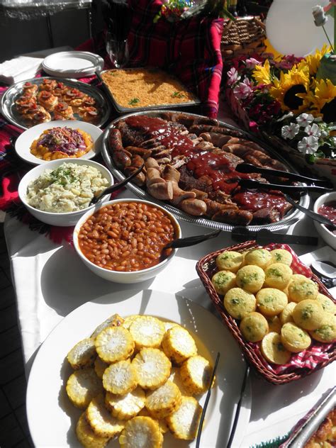 A Table Filled With Lots Of Food On Top Of Plates And Serving Utensils