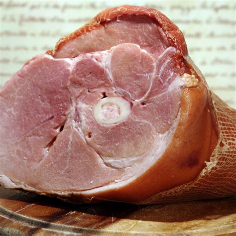 A processed cut taken from the bottom half of the leg. Shank Half Ham - Smoked Ham - Mahogany Smoked Meats