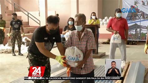 100 odette victims in bohol receive grocery packs roof materials from gma kapuso foundation
