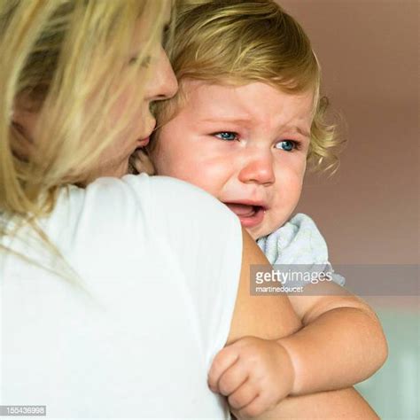 Crying Baby Kiss Photos And Premium High Res Pictures Getty Images