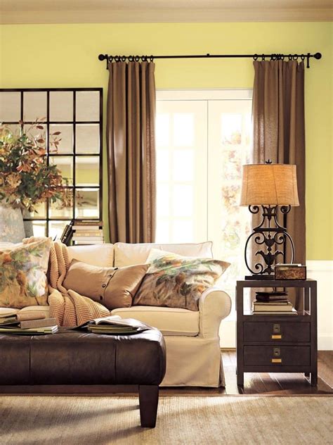 The example is the one you can see in the picture, in which the living room has navy blue walls and cabinets, soft blue sofa with beige cushions, and beige floor. benjamin moore green living room - light beige-green walls, light sofa, dark wood, darker ...