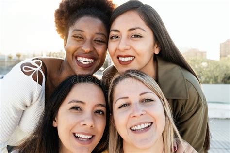 Multiracial Friends Having Fun Together Doing Selfie Outdoor Focus On