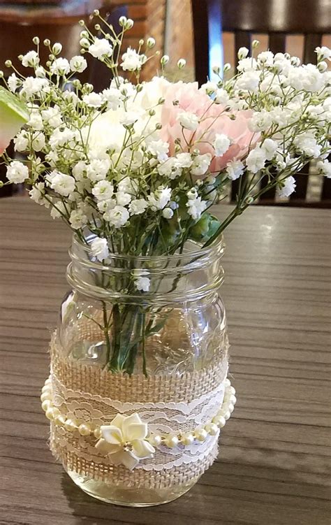 Rustic Mason Jar Centerpiece With Babys Breath And Carnations Carnation