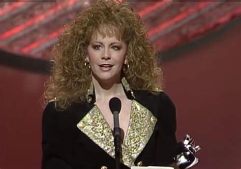 A fine athlete, reba mcentire followed in the footsteps of her rodeo champion father in. Reba-McEntire-Wins-Top-Female-Vocalist-ACM-Awards-1991 ...