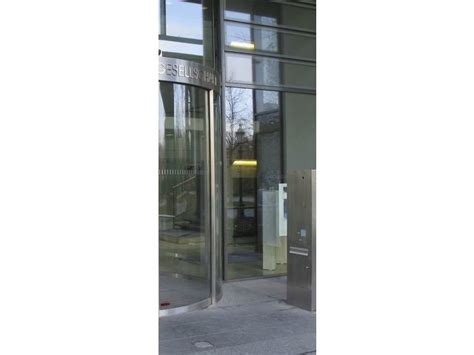 Porte coulissante automatique de 210cm de long et de 257.5 cm de haut. Porte automatique coulissante cintrée TORMAX | Contact ...