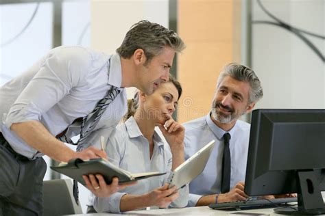Business Team Working On Project In Office Stock Image Image Of