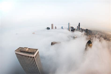 Spectacular Photos Of Chicagos Skyscrapers Piercing Layers Of Fog And