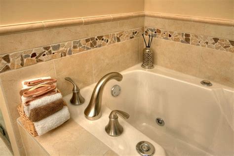 In the event that your tub needs repair, you will want easy. Detail of the decorative tile border surrounding the ...