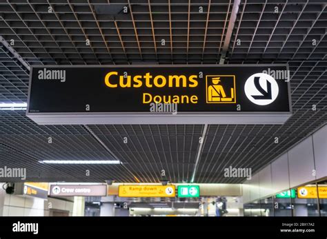 Customs Sign At Schiphol International Airport Poiting Passenergs To